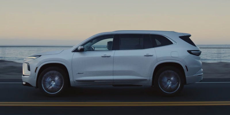 Side profile of 2026 Buick Enclave on highway