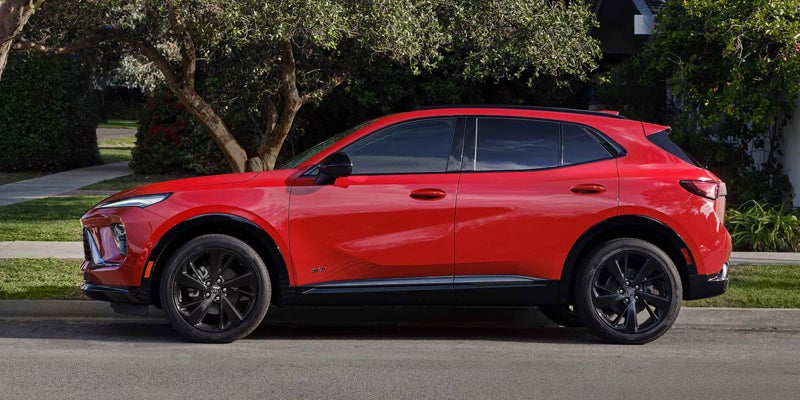 2026 Buick Envision Side view of red Buick Envision SUV