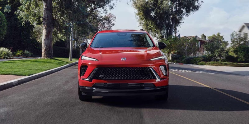 2026 Buick Envision Front view of red Buick Envision on road