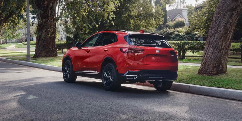 2026 Buick Envision Rear angle view of red Buick Envision