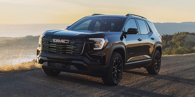 2026 GMC Terrain driving on rugged terrain